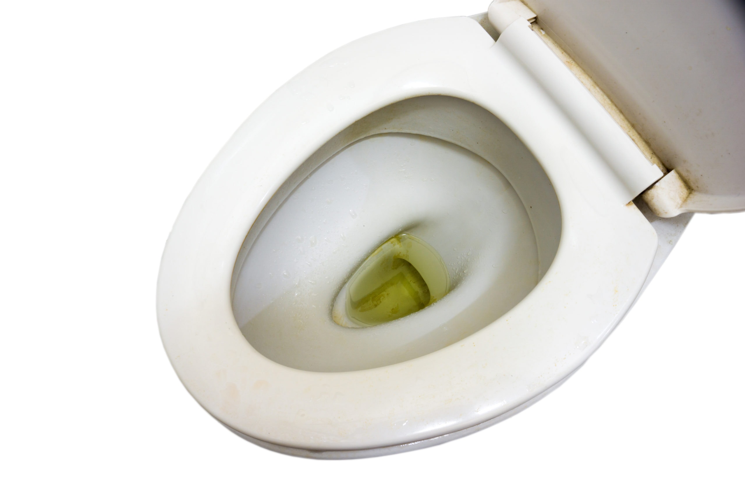 Dirty and unhygienic toilet bowl with limescale stain deposits On a white background