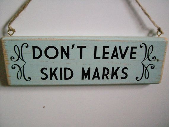 don't leave skid marks toilet sign