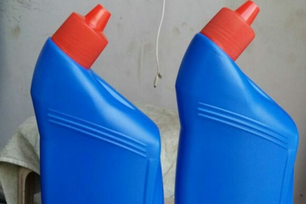 two bottles of chemical cleaner