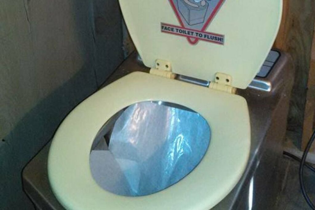 incinerating toilet with special paper in the toilet bowl