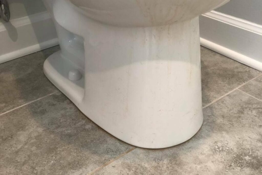 visible stains or dirt on porcelain toilet bowl