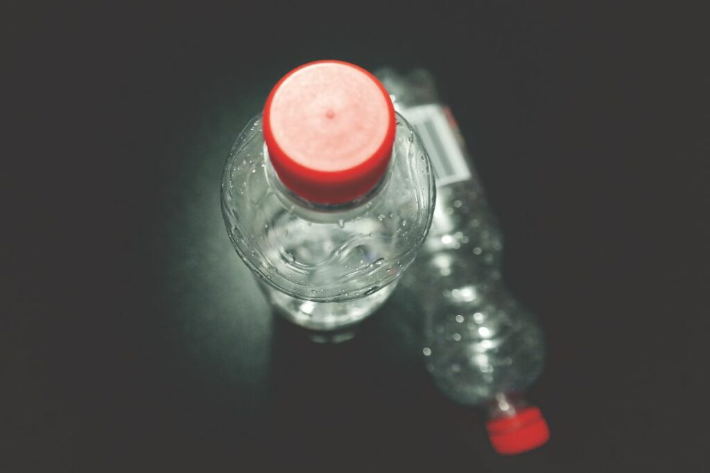 plastic bottles with red cap