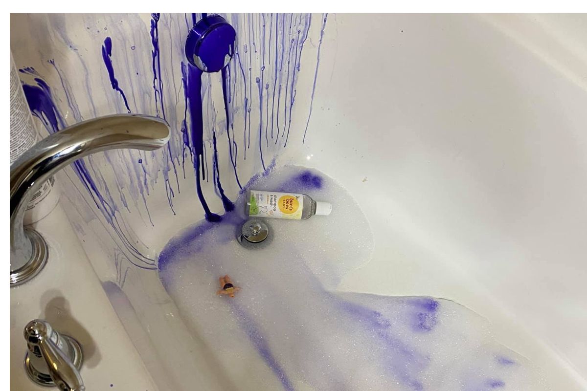 purple shampoo stains in a bathtub