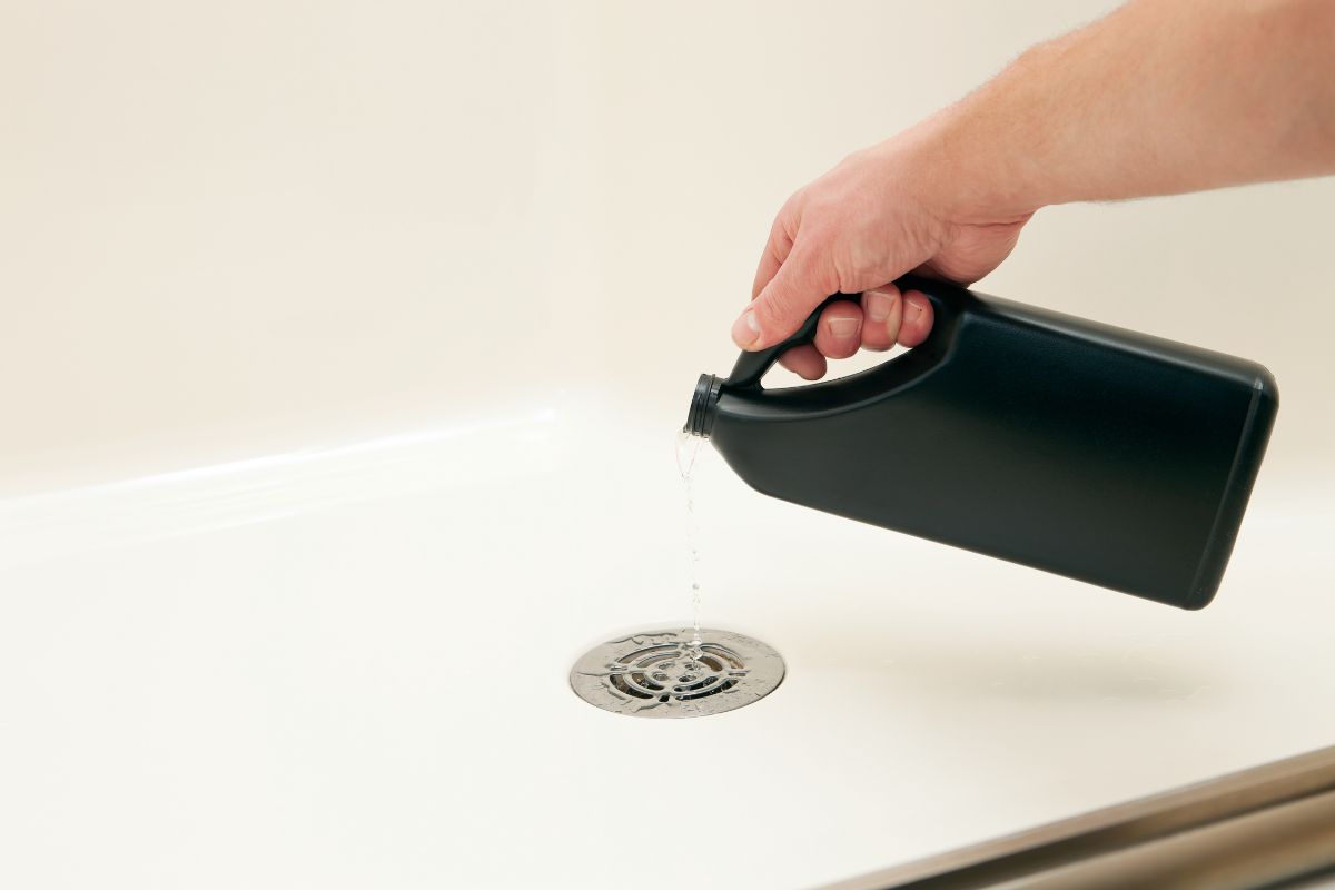 pour cleaner down the shower drain