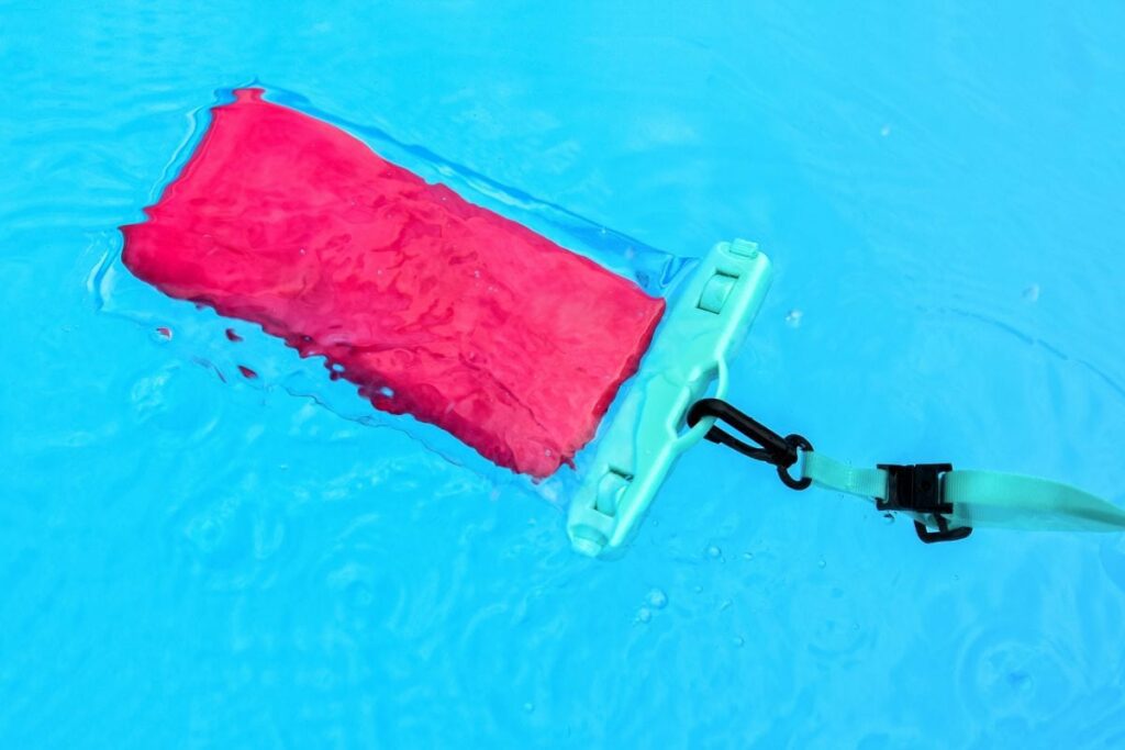 a phone inside a Waterproof Pouch in the water