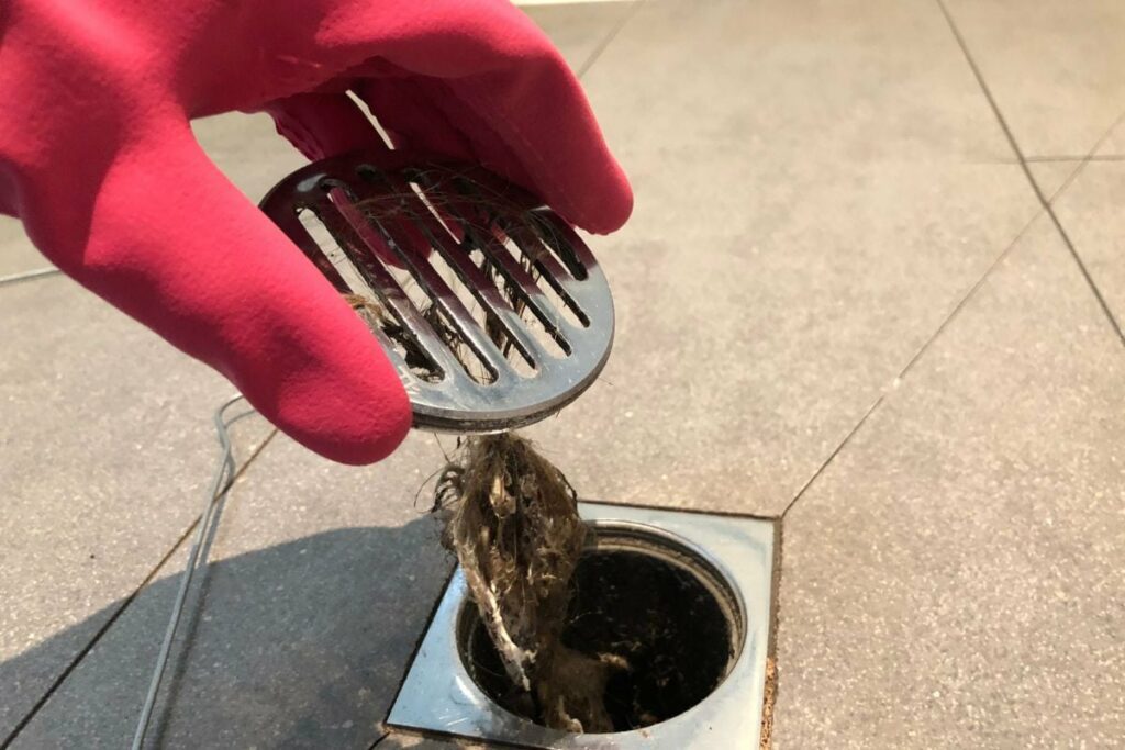 remove shower drain hair by hand