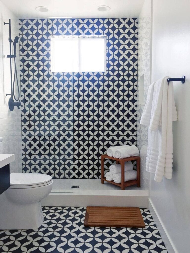 a bathroom with stick vinyl on floor and wall