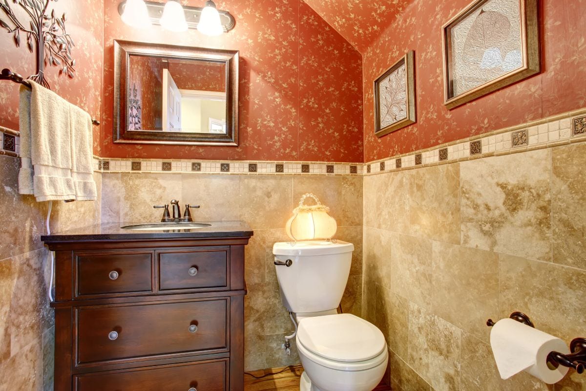 half bathroom that has toilet and vanity
